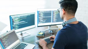 Developer with multiple screens during a store migration